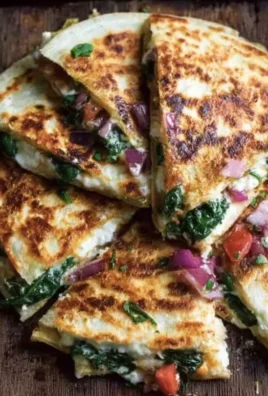 Mediterranean Quesadillas with Spinach, Feta, Mozzarella, and Red Onion