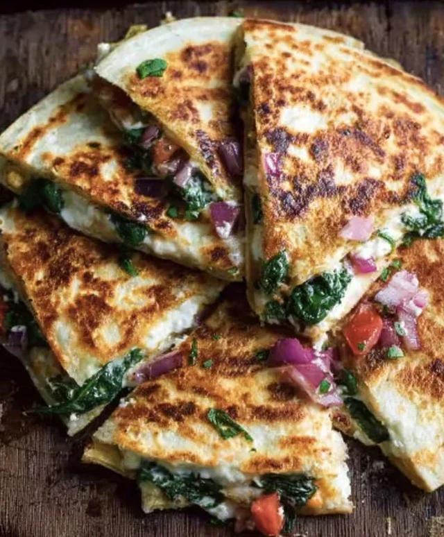 Mediterranean Quesadillas with Spinach, Feta, Mozzarella, and Red Onion