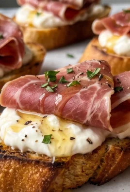 Beef Prosciutto Crostini with Burrata and Lemon Honey Drizzle